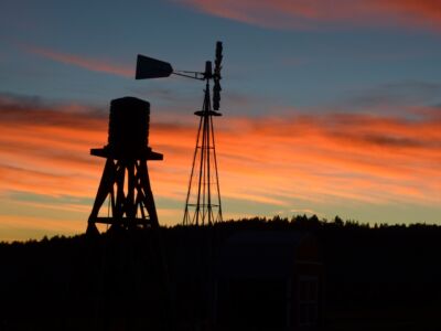 windmill and water tank sunset