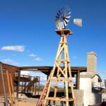 pumping windmill on wood tower