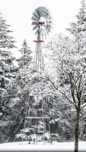 old windmill in snow