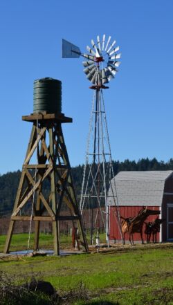 8 Foot Windmill 27 Foot Tower wooden water tank and windmill